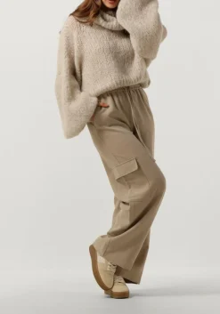 beige american dreams coltrui pepper roll neck cropped