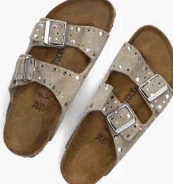 beige birkenstock teenslippers arizona rivet border