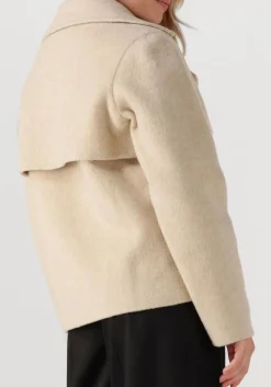 beige janice trenchcoats jean
