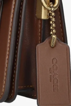 bruine coach schoudertas tabby 20