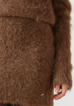 bruine ibana minirok sonia