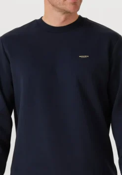 donkerblauwe woolrich trui logo interlock crewneck