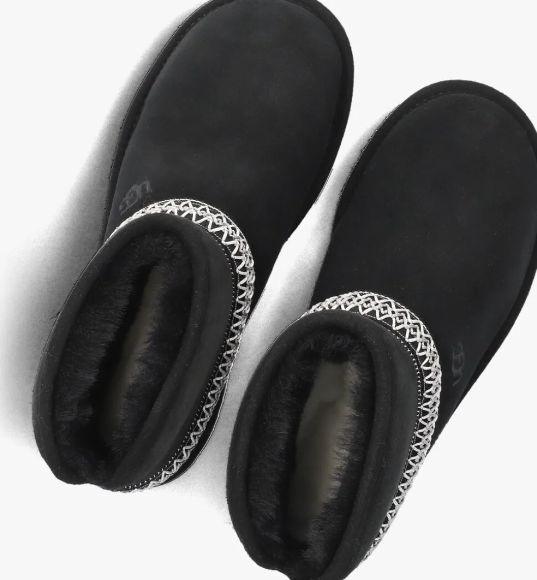 zwarte ugg vachtlaarzen classic mini crescent